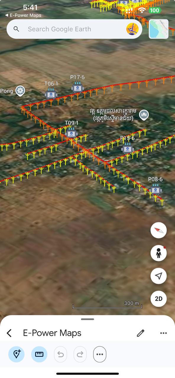 KMZ opened in Google Earth — orange poles, red cable lines, transformer markers, building labels